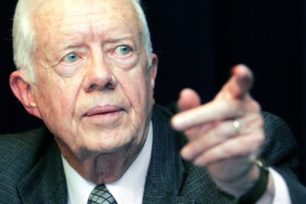 **FILE**Former President Jimmy Carter takes a question during a conference at The Carter Center in Atlanta, Tuesday, June 7, 2005. An independent panel Wednesday, Aug. 24, 2005 reversed a Pentagon recommendation that the New London submarine base in Connecticut, base be closed. One of the panel members even said a letter from Carter _ the only president to ever serve as a submariner _ pleading the panel to keep the base open was one of the reasons he voted against closure. (AP Photo/Ric Feld, File)